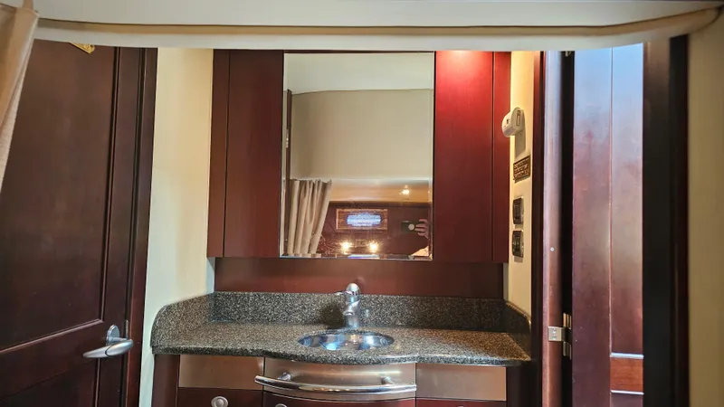 Ii-x-sessive Yacht Photos Pics Luxurious bathroom interior of 2006 Sea Ray 48 Sundancer yacht with granite countertop.