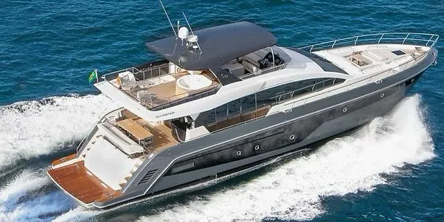  Yacht Photos Pics Luxurious 2026 Schaefer 770 yacht cruising on open water, showcasing sleek design and spacious deck.