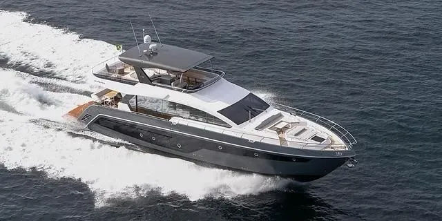 Luxury Schaefer 770 yacht cruising on open water, 2026 model.