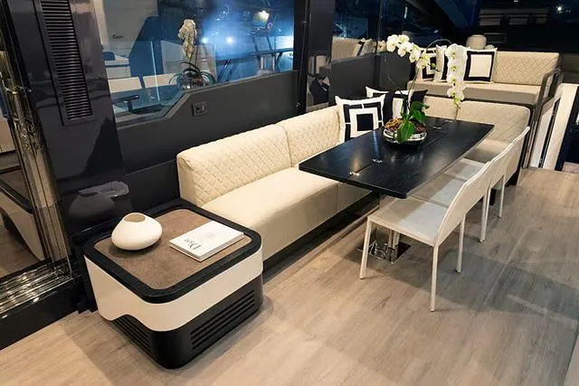  Yacht Photos Pics Luxurious interior of 2026 Schaefer 770 yacht with elegant seating and dining area.