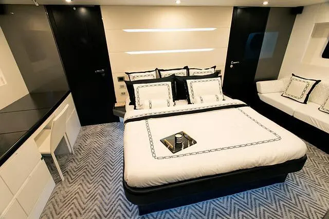  Yacht Photos Pics Luxurious Schaefer 770 yacht bedroom, 2026 model, featuring elegant bedding and modern decor.