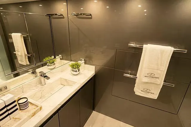  Yacht Photos Pics Luxurious Schaefer 770 bathroom, 2026 model, with sleek design, marble countertop, and elegant fixtures.