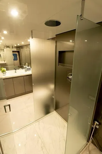  Yacht Photos Pics Luxurious Schaefer 770 yacht bathroom with modern fixtures and glass shower, 2026 model.