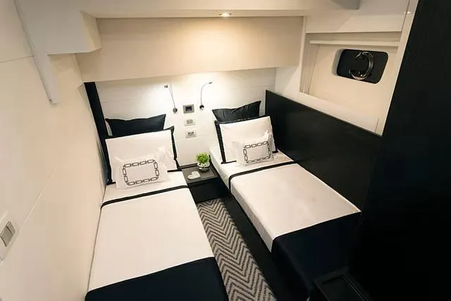  Yacht Photos Pics Luxurious twin cabin interior on Schaefer 770 yacht, 2026 model, with modern decor and lighting.