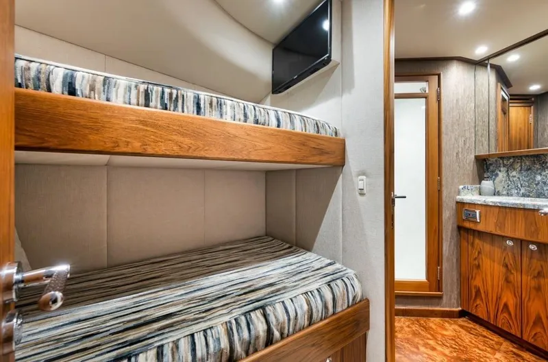 Artemis Yacht Photos Pics Interior of 2020 Merritt 77 Sportfish Convertible with bunk beds and modern amenities.