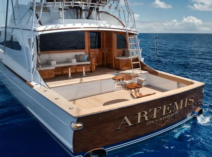 Artemis Yacht Photos Pics 2020 Merritt 77 Sportfish Convertible yacht on open sea, featuring spacious deck and luxurious seating.