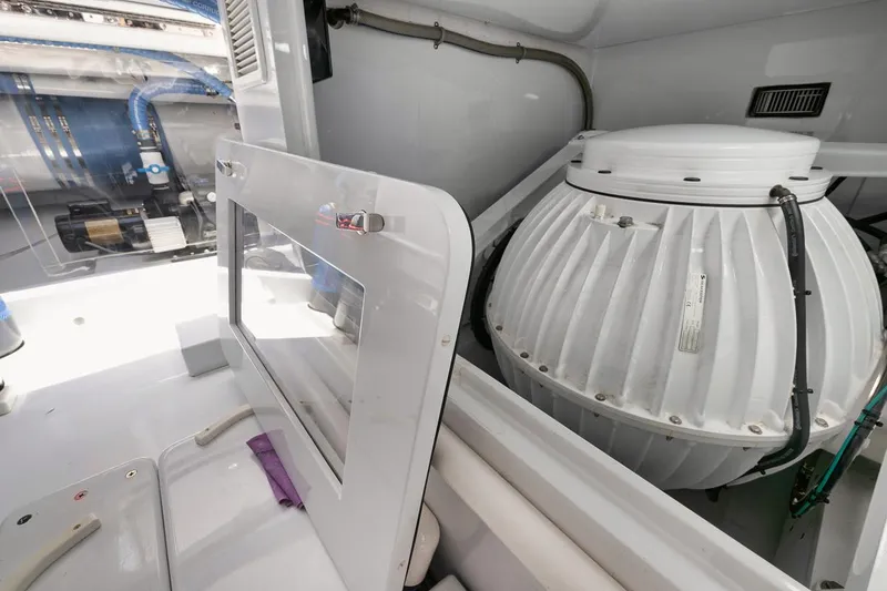 Artemis Yacht Photos Pics Engine room of 2020 Merritt 77 Sportfish Convertible, featuring advanced marine equipment.