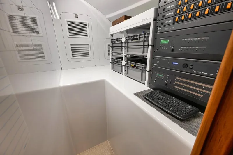 Artemis Yacht Photos Pics Control room of a 2020 Merritt 77 Sportfish Convertible with advanced electronic equipment.