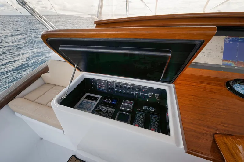 Artemis Yacht Photos Pics Control panel of 2020 Merritt 77 Sportfish Convertible yacht, open on deck.
