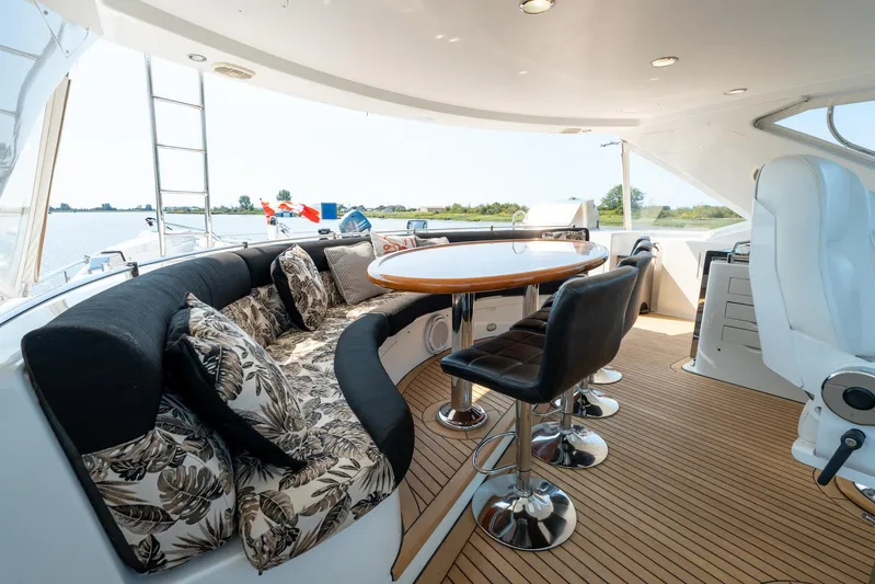 Memory Bank Yacht Photos Pics Luxurious 2007 Ocean Alexander 80 Cockpit Motoryacht with elegant outdoor seating and dining area.