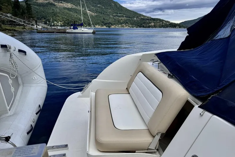  Yacht Photos Pics 2008 Sea Ray 330 Sundancer boat with scenic lake and mountain backdrop.