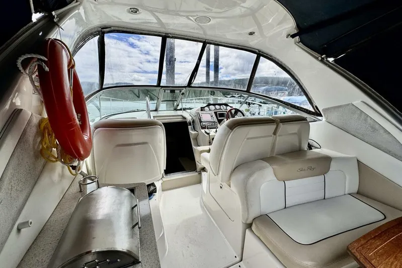  Yacht Photos Pics Interior of 2008 Sea Ray 330 Sundancer yacht with helm and seating area.