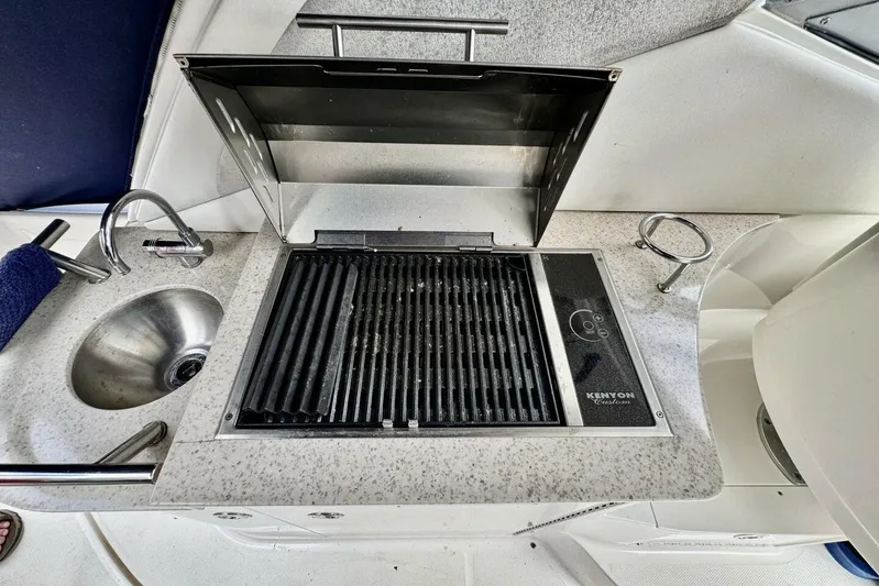  Yacht Photos Pics Outdoor kitchen on 2008 Sea Ray 330 Sundancer with grill and sink.