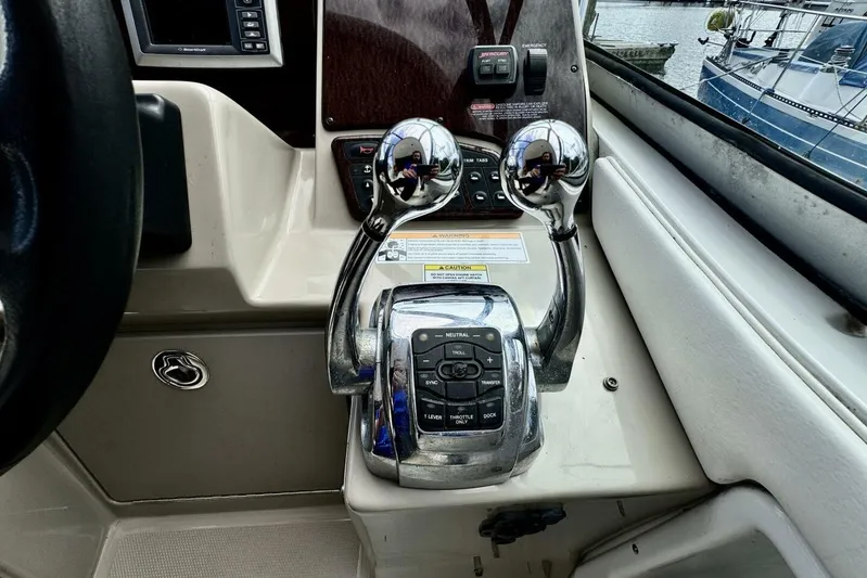  Yacht Photos Pics Control panel of 2008 Sea Ray 330 Sundancer boat with throttle levers.