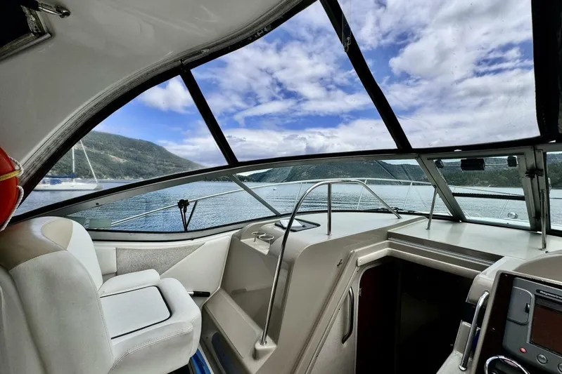  Yacht Photos Pics 2008 Sea Ray 330 Sundancer interior with scenic lake and mountain view.