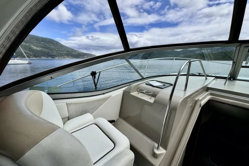  Yacht Photos Pics 2008 Sea Ray 330 Sundancer cockpit with scenic lake and mountain view.