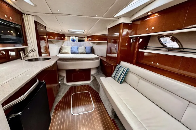  Yacht Photos Pics Luxurious interior of 2008 Sea Ray 330 Sundancer yacht with modern amenities and elegant design.