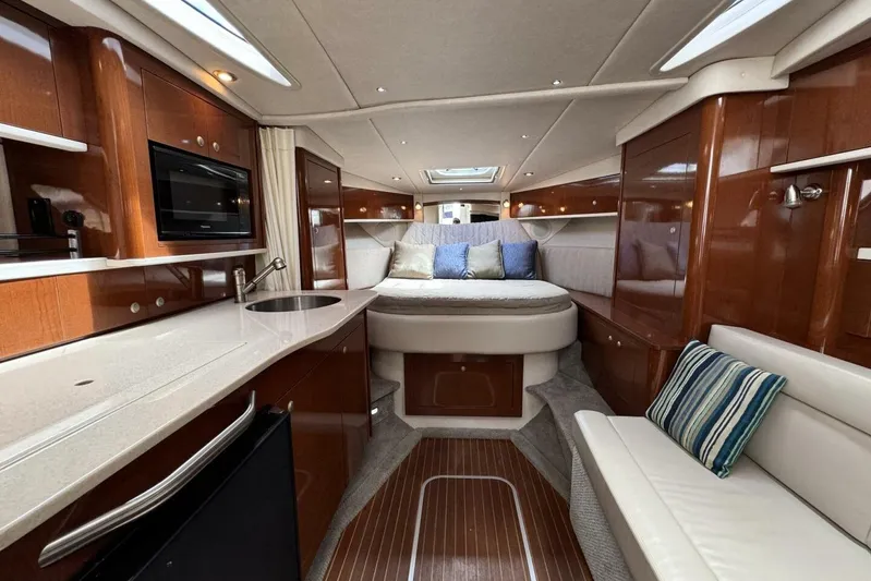  Yacht Photos Pics Luxurious interior of 2008 Sea Ray 330 Sundancer yacht with modern amenities and elegant design.