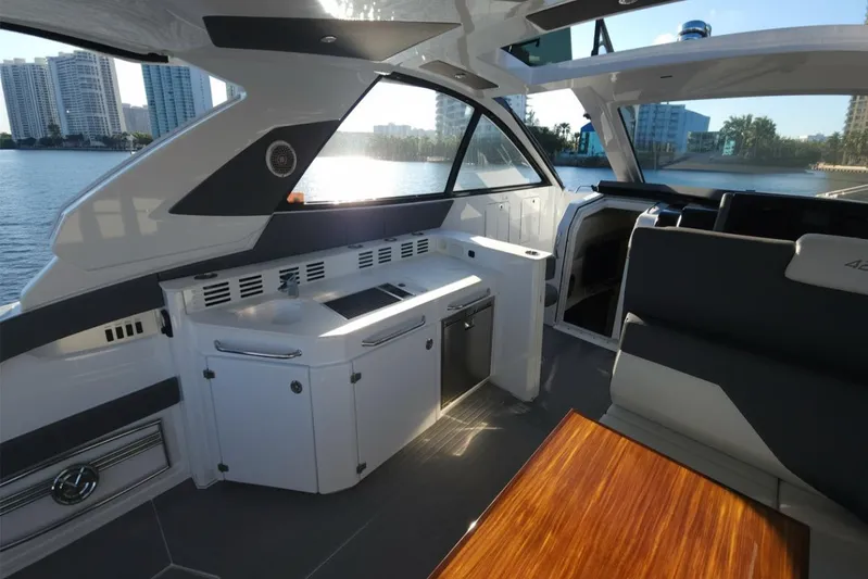  Yacht Photos Pics Interior of 2021 Cruisers Yachts 42 GLS OB with modern design and waterfront view.