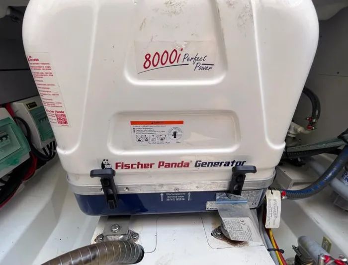 Rub A Dub Yacht Photos Pics Fischer Panda generator in a 2023 Beneteau Antares 11 OB boat engine room.