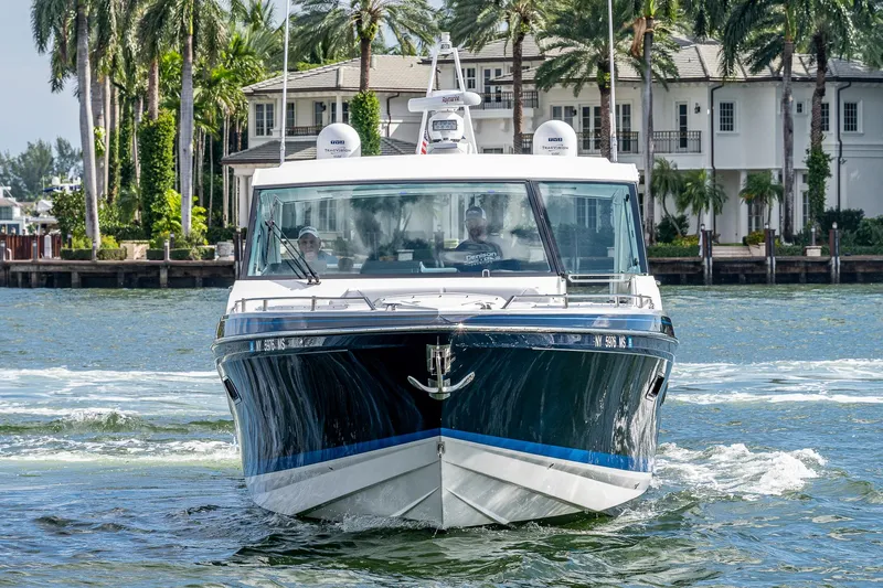  Yacht Photos Pics 2022 Formula 430 SSC luxury yacht cruising on a scenic waterway.