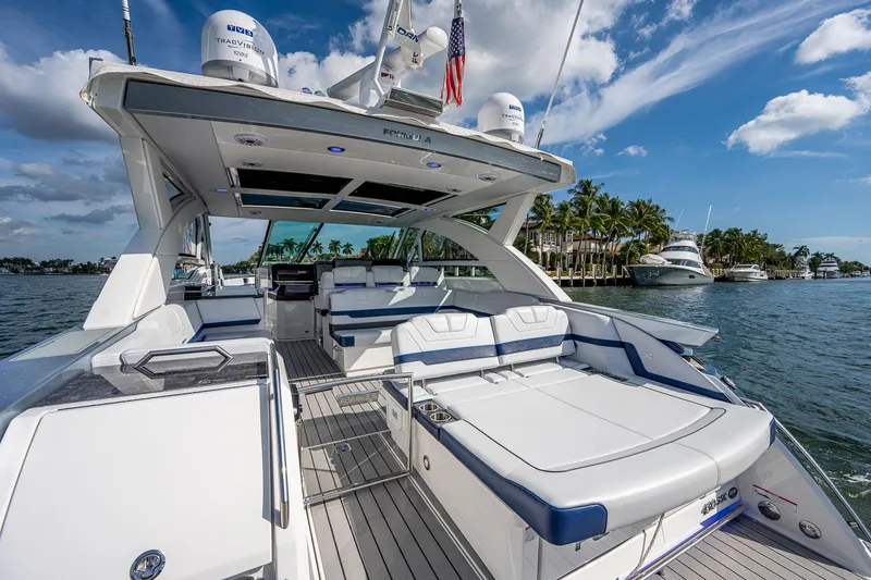  Yacht Photos Pics Luxurious 2022 Formula 430 SSC yacht with spacious deck and scenic waterfront view.