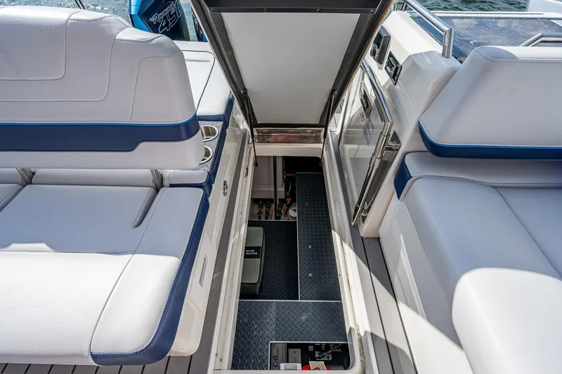  Yacht Photos Pics 2022 Formula 430 SSC boat interior with open storage compartment.