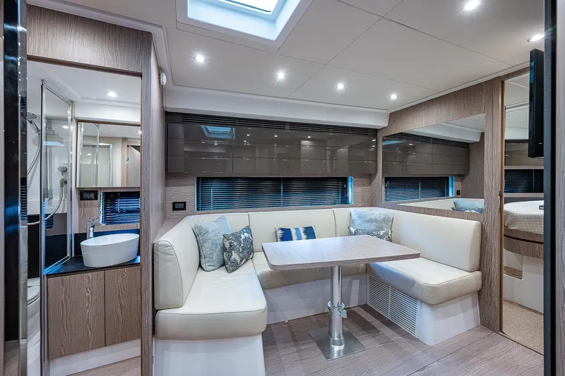  Yacht Photos Pics Luxurious interior of 2021 Azimut Atlantis 45 yacht with modern seating and elegant decor.