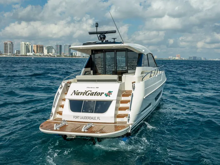 Man Cave Yacht Photos Pics 2021 Maritimo X50 yacht cruising near Fort Lauderdale skyline.
