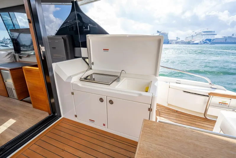 Man Cave Yacht Photos Pics Outdoor kitchen on 2021 Maritimo X50 yacht with ocean view.