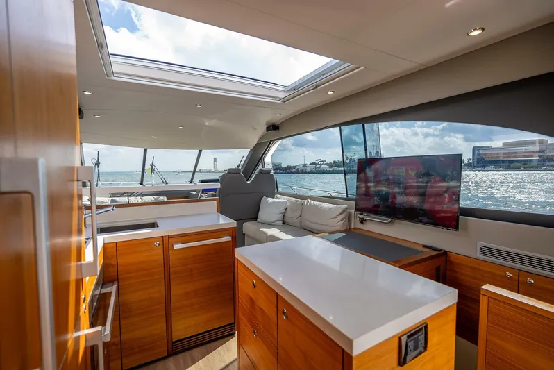 Man Cave Yacht Photos Pics Interior of 2021 Maritimo X50 yacht with modern kitchen and ocean view.