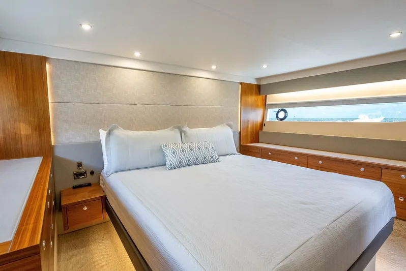 Man Cave Yacht Photos Pics Luxurious bedroom interior of 2021 Maritimo X50 yacht with elegant wood finishes.