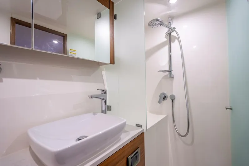 Man Cave Yacht Photos Pics Modern bathroom in 2021 Maritimo X50 yacht with sleek sink and shower.
