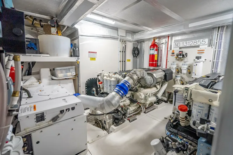 Man Cave Yacht Photos Pics Engine room of 2021 Maritimo X50 yacht, featuring advanced machinery and equipment.