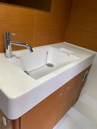 Hygge Yacht Photos Pics Modern sink in 2017 Jeanneau Sun Odyssey 479 yacht bathroom.