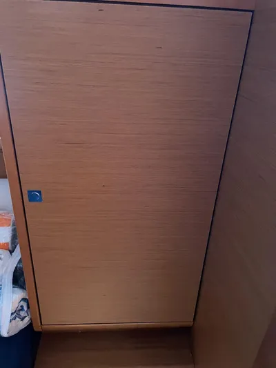 Hygge Yacht Photos Pics Wooden cabinet door inside 2017 Jeanneau Sun Odyssey 479 yacht interior.
