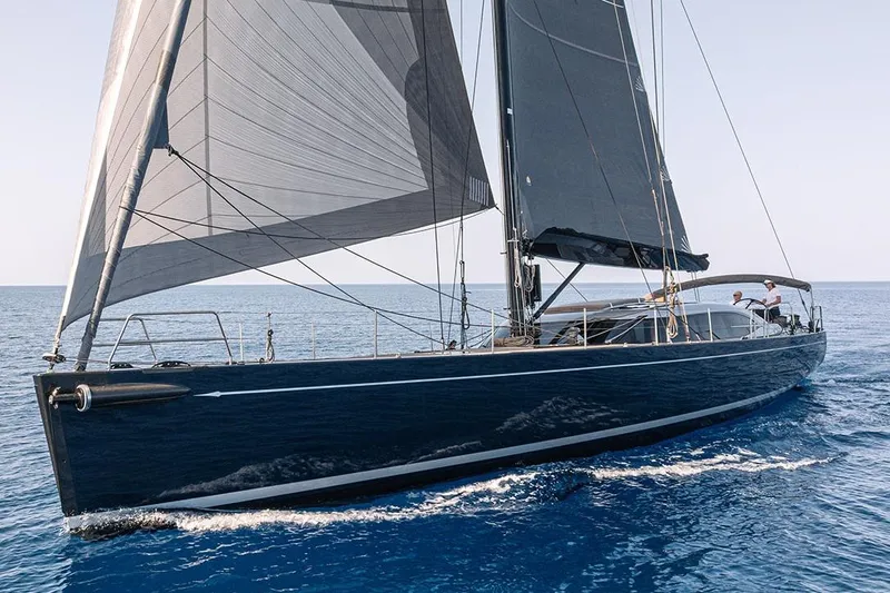 Caiarossa Yacht Photos Pics Sleek 2009 Seaway Shipman 72 sailing yacht gliding on open sea.