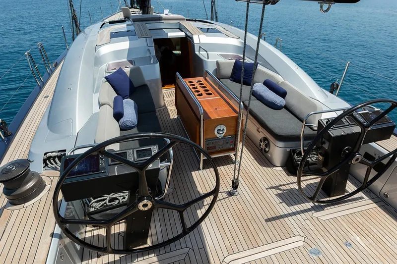 Caiarossa Yacht Photos Pics Luxurious 2009 Seaway Shipman 72 yacht deck with dual steering wheels and cushioned seating.