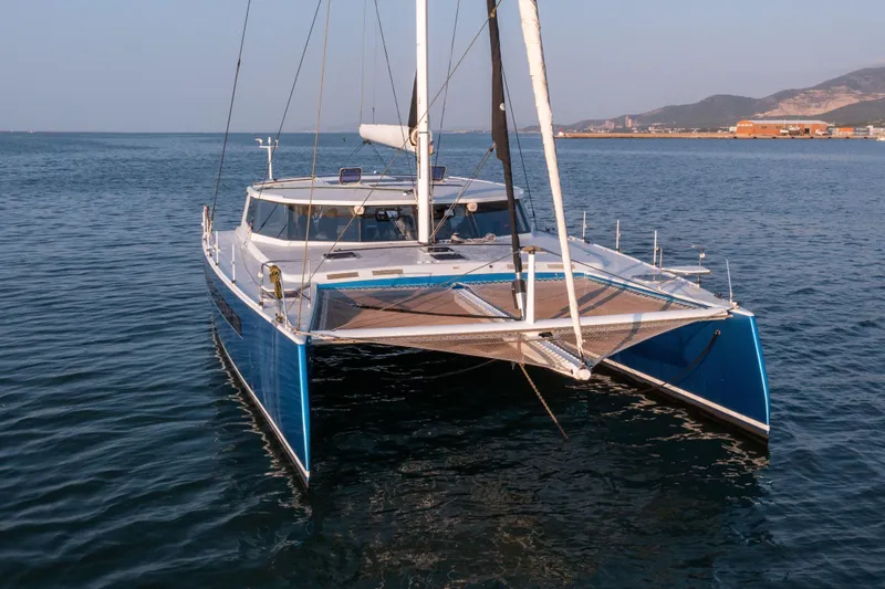 Ondine Blue Yacht Photos Pics 2016 Balance 526 catamaran sailing on calm waters, showcasing sleek design and modern features.