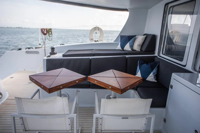 Ondine Blue Yacht Photos Pics Luxurious seating area on 2016 Balance 526 yacht with ocean view and stylish decor.