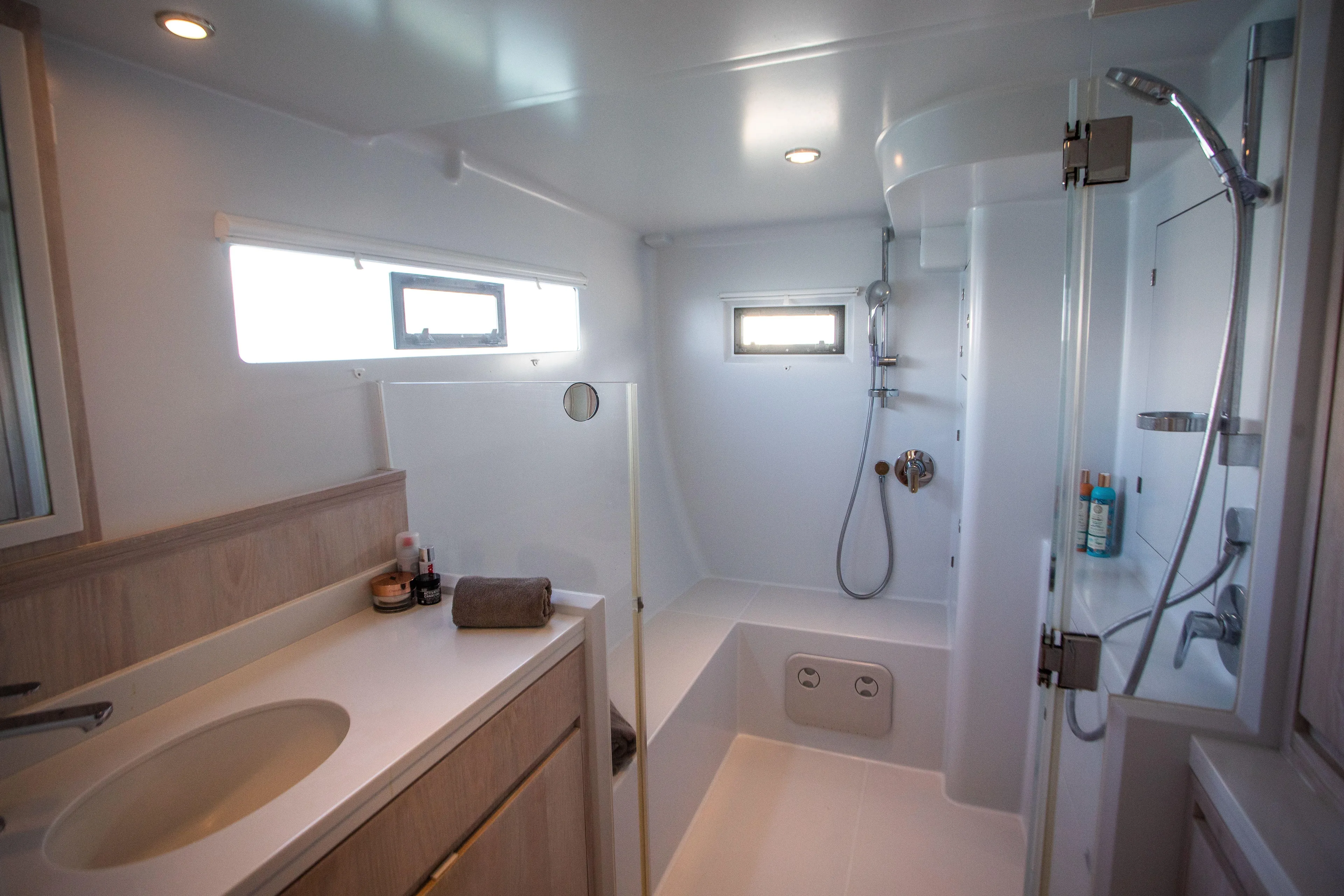 Ondine Blue Yacht Photos Pics Modern bathroom interior in a 2016 Balance 526 yacht, featuring sleek fixtures and ample lighting.