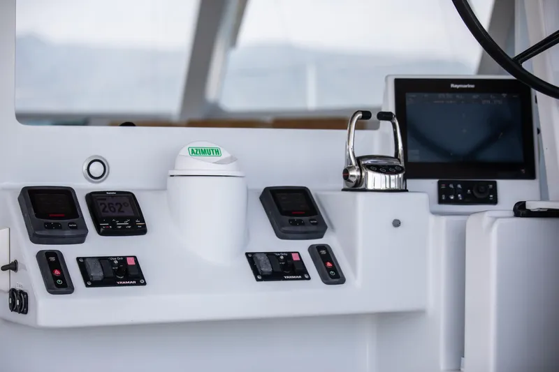 Ondine Blue Yacht Photos Pics Control panel of a 2016 Balance 526 yacht with navigation instruments and displays.