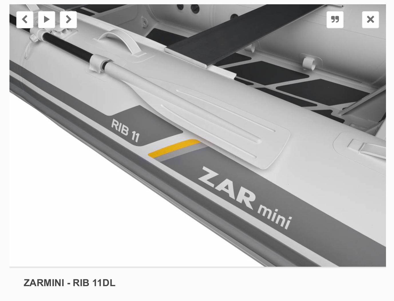 2022 ZAR Mini 11 HDL inflatable boat with oar and sleek design.