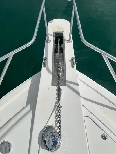  Yacht Photos Pics Bow of 2002 Bertram 510 Convertible with anchor chain and windlass.
