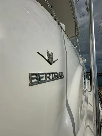  Yacht Photos Pics Close-up of 2002 Bertram 510 Convertible yacht with logo.