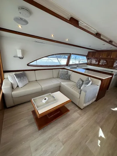  Yacht Photos Pics Luxurious interior of a 2002 Bertram 510 Convertible yacht with modern furnishings.