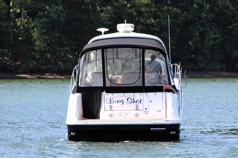  Yacht Photos Pics 2008 Sea Ray 330 Sundancer boat named "Long Shot" on a serene lake.