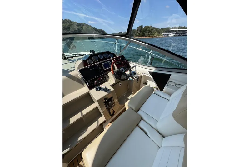  Yacht Photos Pics 2008 Sea Ray 330 Sundancer helm with luxurious seating and modern controls.