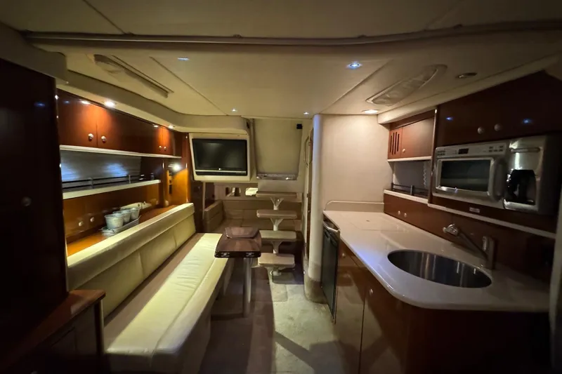  Yacht Photos Pics Luxurious interior of 2008 Sea Ray 330 Sundancer yacht with modern amenities and elegant design.