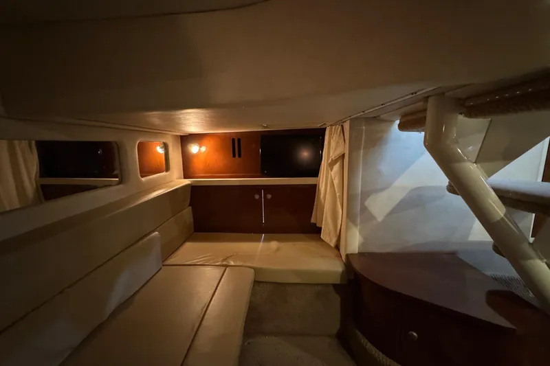  Yacht Photos Pics Interior cabin of 2008 Sea Ray 330 Sundancer with cozy seating and ambient lighting.